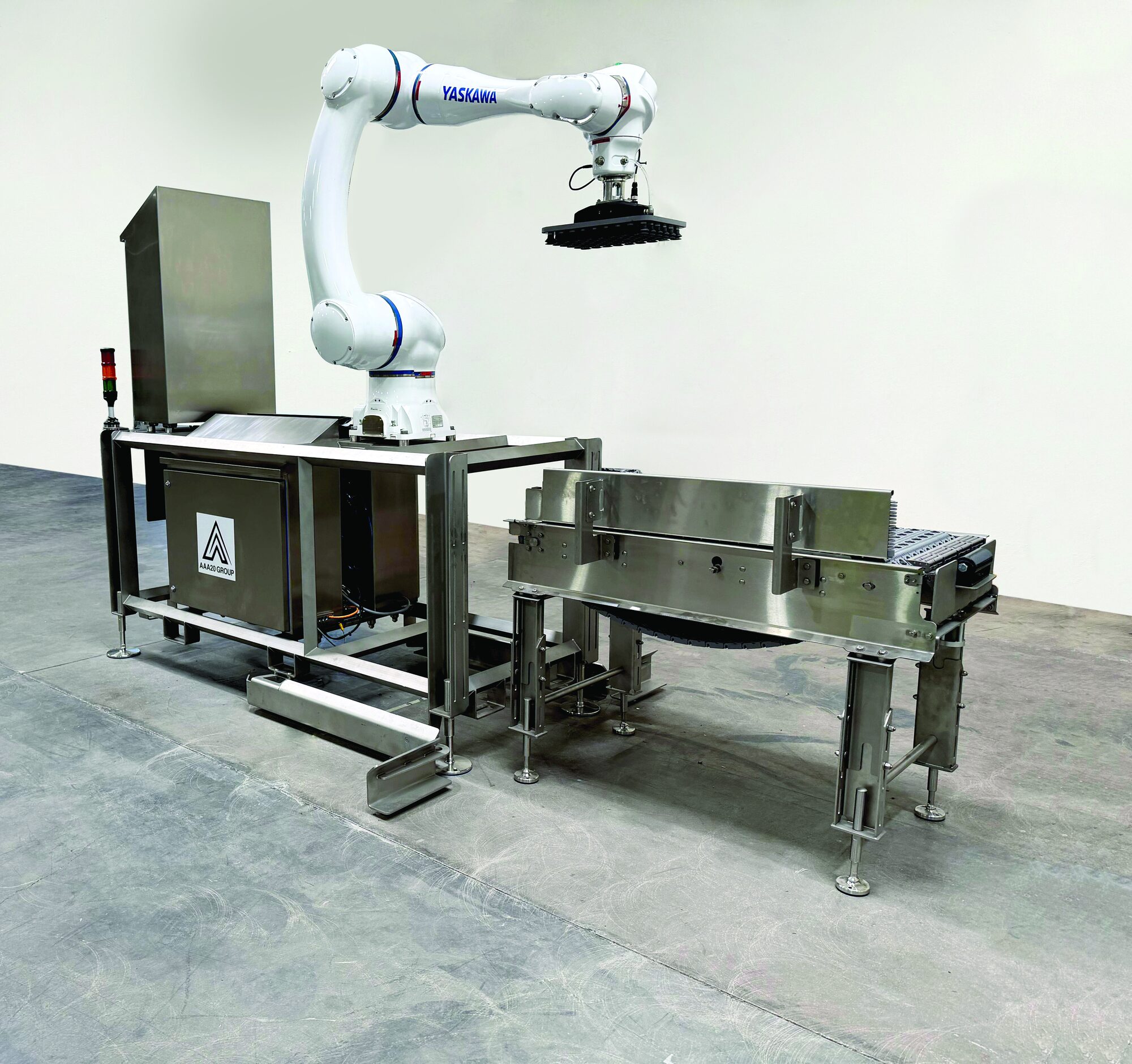 CP-66-WD washdown robotic palletizing cell with Yaskawa arm and AAA20 Group enclosure
